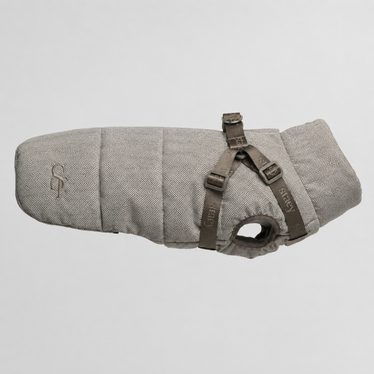 Vera quilted dog coat in mocca herringbone with a built-in harness